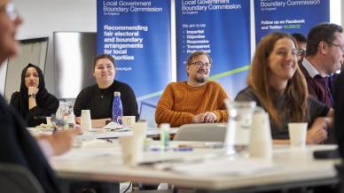 Group of LGBCE staff listening to presentation